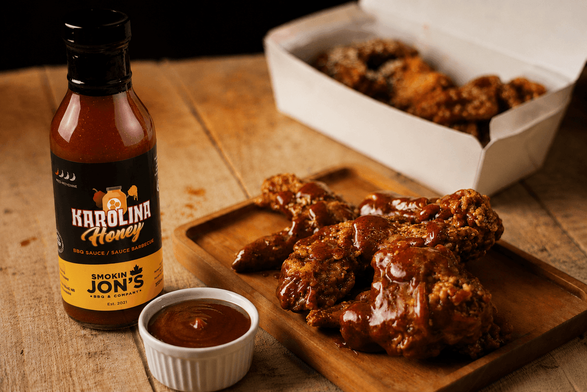 Chicken wings served with Smokin Jon’s Karolina Honey sauce